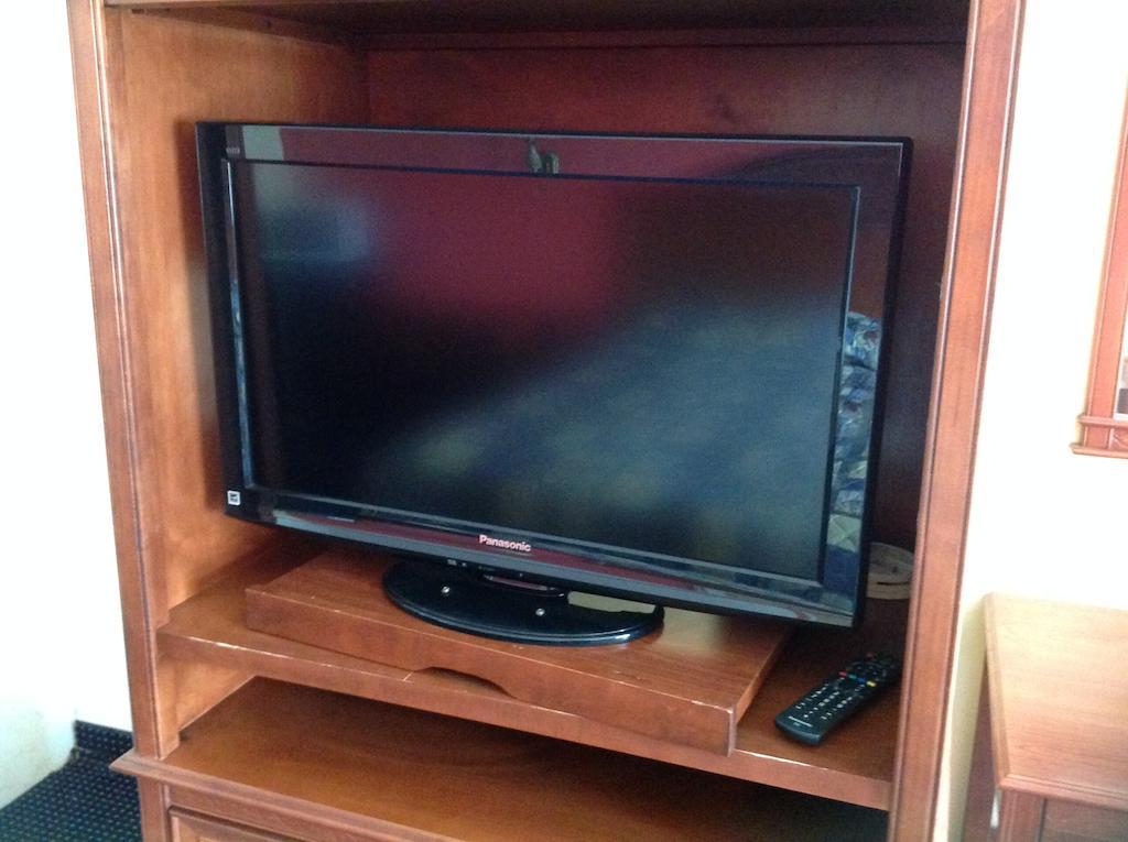 Executive Inn & Suites Shepherd Quarto foto